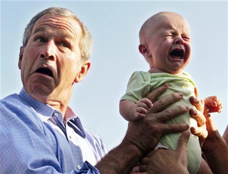 bush_holding_crying_baby-ashx.jpg
